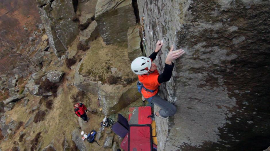 Guy VG "video still of Ollie on The Zone just before he commited to a drop test of the skyhooks using himself, dedicated headpointer that he is"